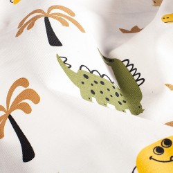Happy Dinosaurs and Palm Trees Jersey Fabric | Wolf Fabrics