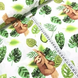 Printed cotton fabric with lazy perched and surrounded by green leaves | Wolf Fabrics