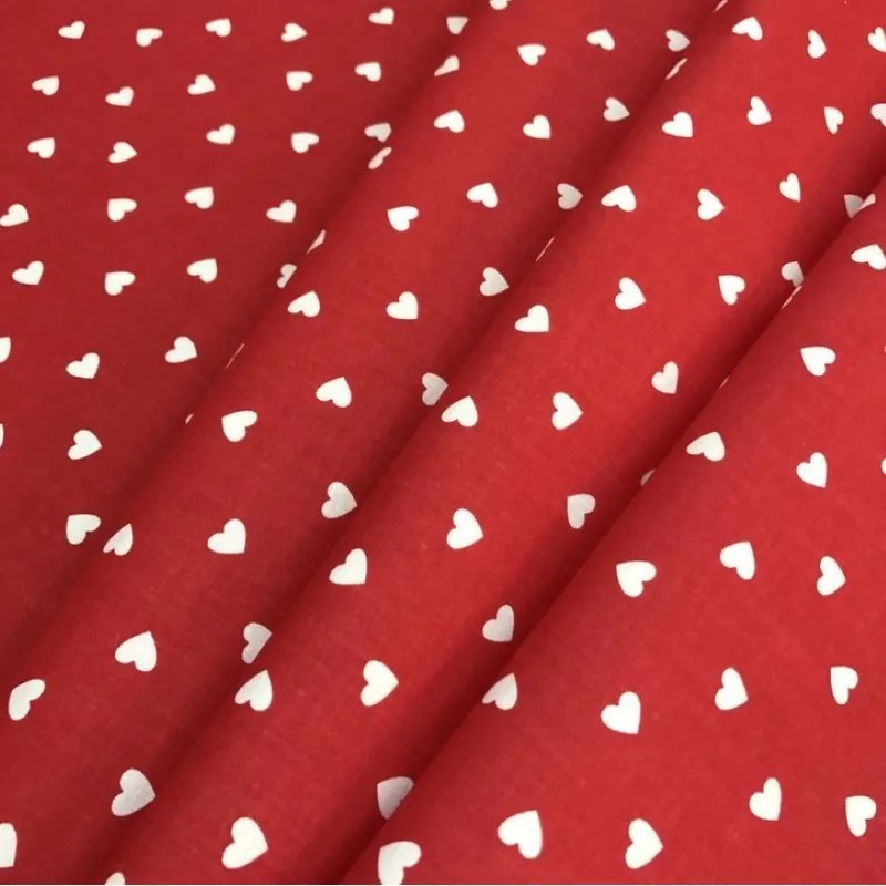 Red cotton fabric with white hearts for Valentine's Day