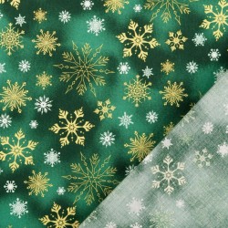 Fabric Cotton Gold and white snowflakes green background | Wolf Fabrics