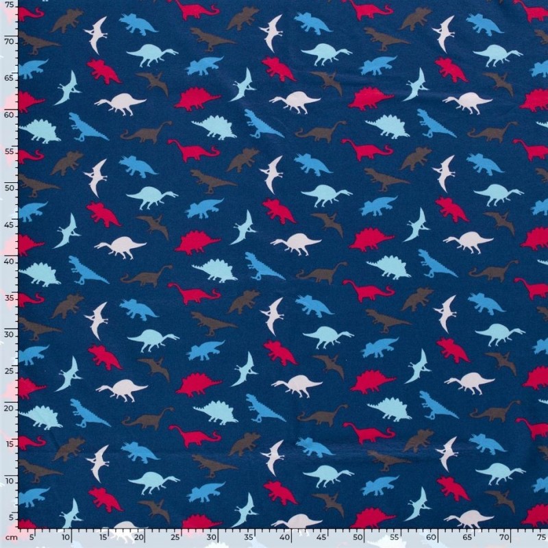 Multicolored dinosaur patterned cotton jersey fabric