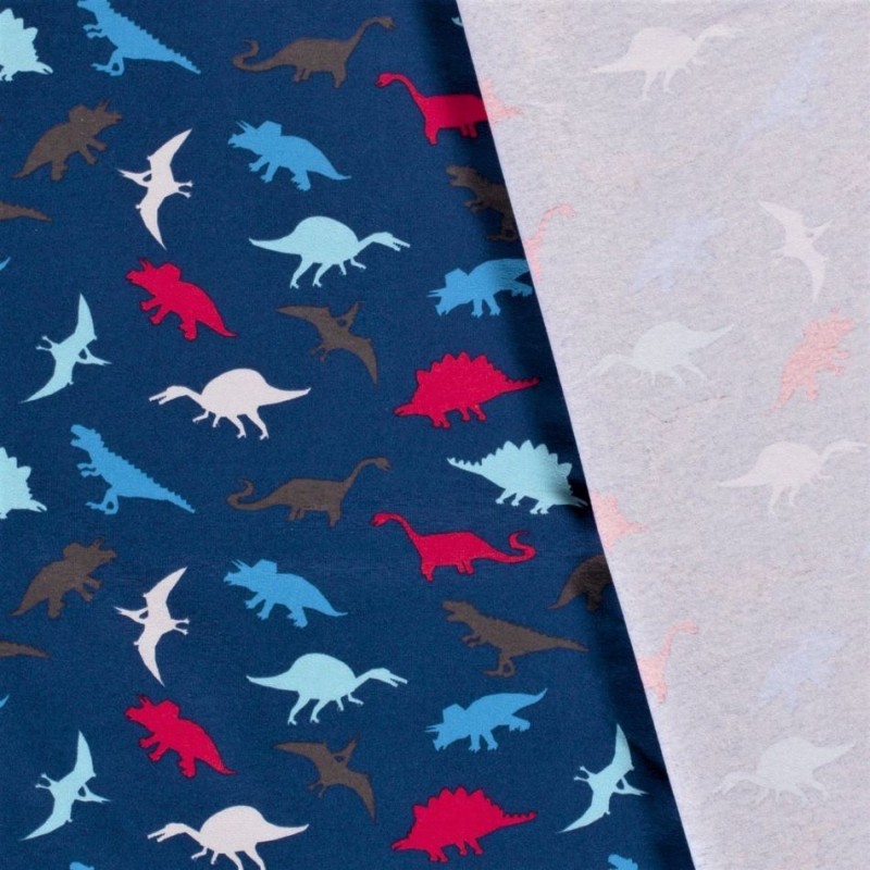 Multicolored dinosaur patterned cotton jersey fabric