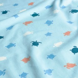 Fabric Jersey Cotton Marine Turtles  turquoise blue background| Wolf Fabrics